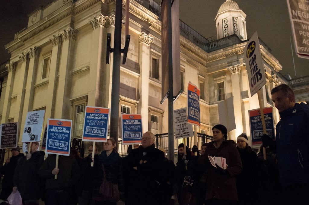 Staff members of London's National Gallery and members of the PCS trade union, held a protest on Monday evening, January 19, 2015 outside the gallery to demonstrate against the privatization of the London museum. Photo by Jay Shaw Baker/NurPhoto via Getty Images.