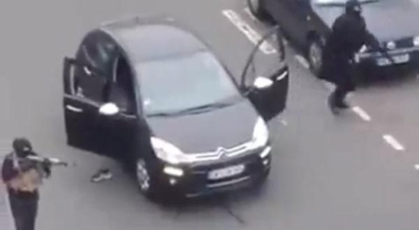 Still from a video showing the assailants claiming to have "killed" Charlie Hebdo.