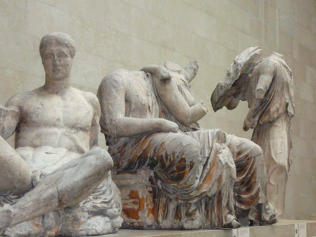 Statuary from the east pediment of the Parthenon on display at the British Museum in London. Photo by Ejectgoose, public domain.