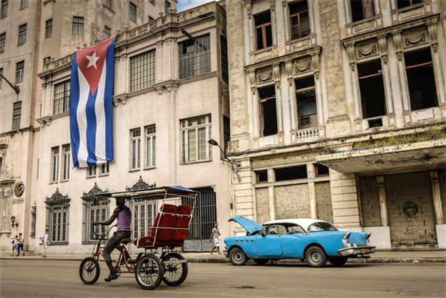 A street in Cuba. Photo: Adalberto Roque, courtesy AFP/Getty Images.