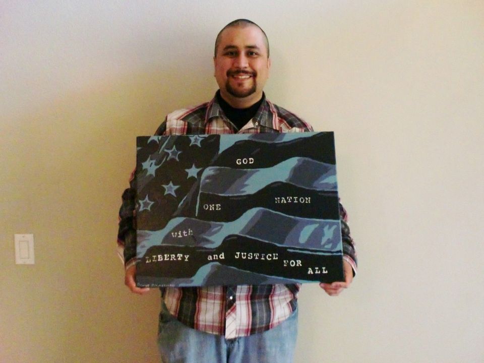 George Zimmerman with his $100,000 painting.
