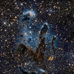 The Pillars of Creation photographed in near-infrared light, better showing the formation of stars. Photo: NASA.