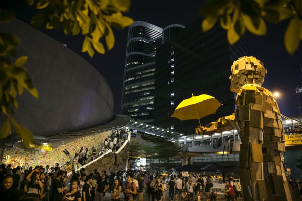 Hong Kong's <em>Umbrella Man</em> sculpture, by the artist known as Milk