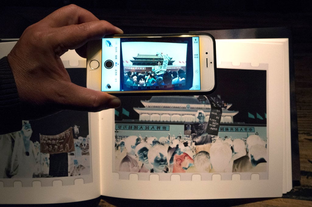 The negative images in Xu Yong's Negatives can be seen in their true colors using a smartphone camera set to "inverted colors." Photo: Gilles Sabrie, courtesy the New York Times.