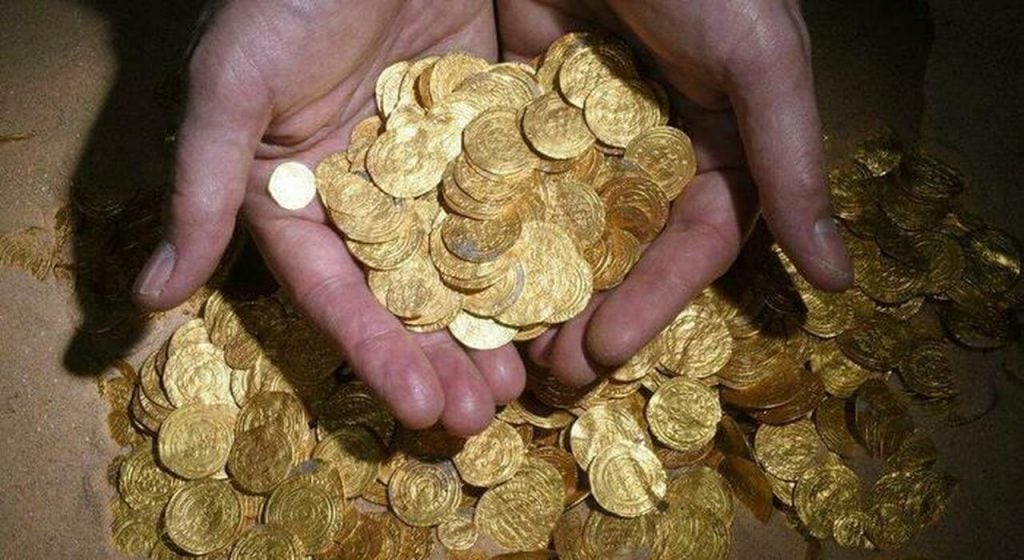 The largest hoard of gold coins found in Israel was discovered in the seabed of a harbor in the Mediterranean Sea port of Caesarea National Park. Photo by Clara Amit courtesy of the Israel Antiquities Authority/EPA.
