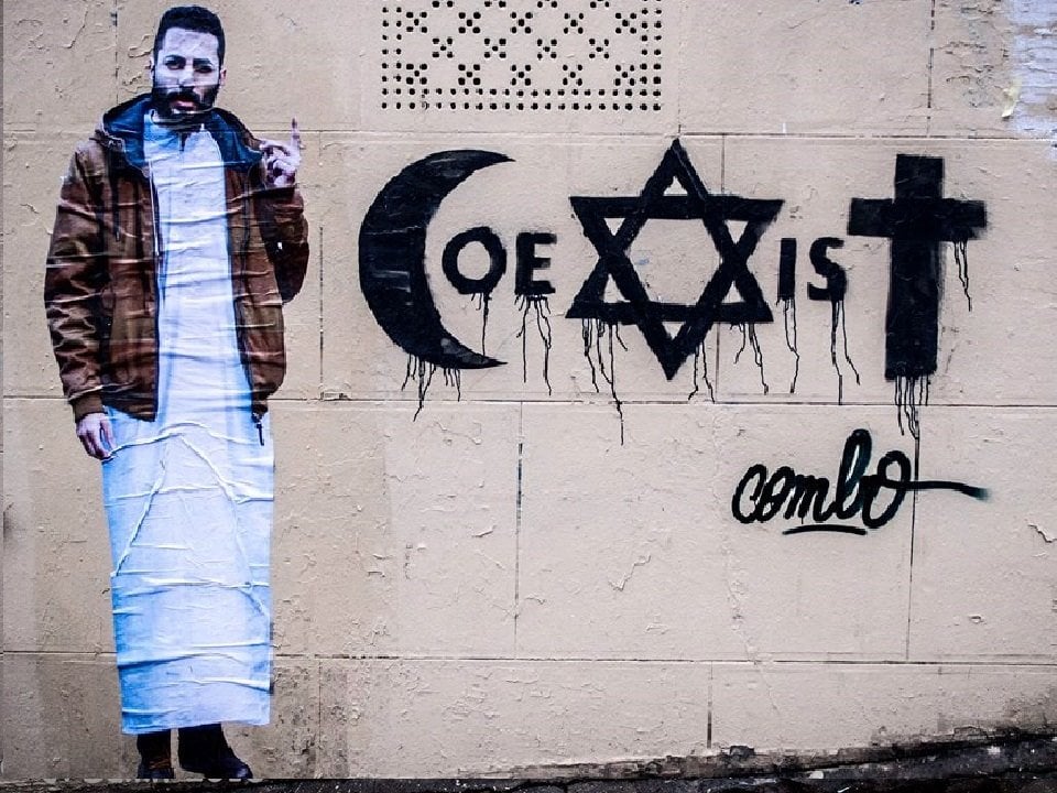 Combo's Coexist mural in Paris. Photo courtesy of the artist.