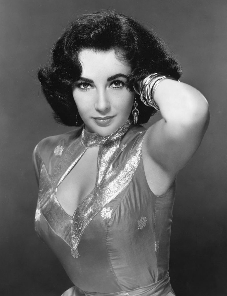 Elizabeth Taylor in a publicity photo by MGM from the 1950s. Photo courtesy of MGM, public domain.