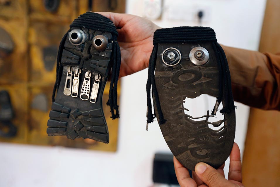 Akeel Khreef, sculptures of ISIS jihadists made of old shoe soles. Photo: Sabah Arar, courtesy AFP Photo.