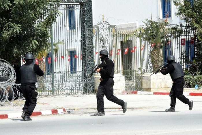 Tunisian security forces secure the area after gunmen attacked the Bardo Museum in Tunis. Photo: Fethi Belaid, courtesy AFP.