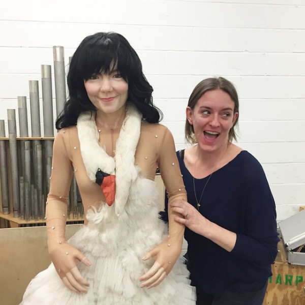 A colleague of Biesenbach's in the art handling and preparation department posing with Bjork's swan dress.Photo: Instagram/@klausbiesenbach