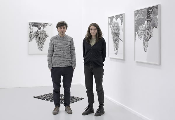 Peter Kersten and gallery director Bianca Heuser in the show by Yuki Kimura