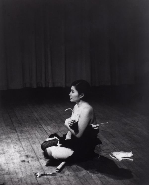 <i>Cut Piece</i> (1964) performed by Yoko Ono in New Works of Yoko Ono, Carnegie Recital Hall, New York, March 21, 1965. Courtesy Lenono Photo Archive, New York, © Minoru Niizuma. 