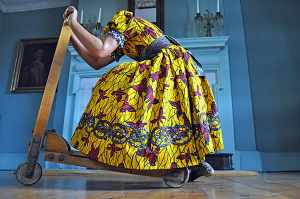 Yinka Shonibare, Girl on Scooter (2009). Ann and Mel Schaffer Family Collection. Photo: Trish Mayo, courtesy Morris-Jumel Mansion.