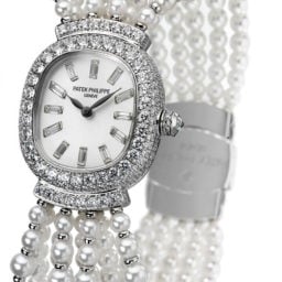 Patek Philippe wristwatch with pearls, on loan from Queen Elizabeth II for the exhibitionPhoto: Courtesy Patek Phillipe