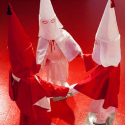 Paul Rucker, "Storm in the Time of Shelte,r" installation view of children's Klan robes