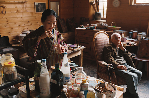 Balthus and Setsuko Klossowska de Rola in the artist’s studio at the Grand Chalet in Rossinière, SwitzerlandPhoto via: The Art of the Room