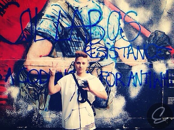 Electre posing in front of Combo's mural after vandalizing it. <br>Photo: via Elektreunleashed.fr</br>