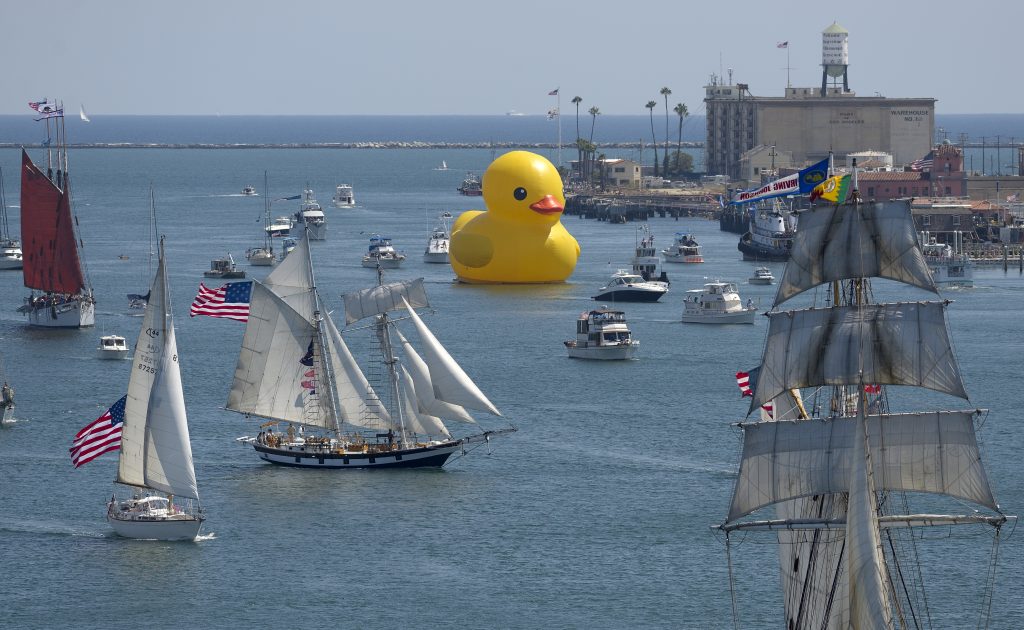 Giant Rubber Duck, a giant yellow vinyl duck by Dutch artist Florentijn Hofman during the parade of tall ships at Tall Ships Festival L.A. in the Port of Los Angeles in 2014. Photo by Jeff Gritchen/Digital First Media/Orange County Register via Getty Images.