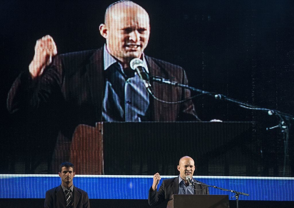 Israeli Economy Minister and head of the right-wing Jewish Home party, Naftali Bennett, who runs for the country's general election speaks during a campaign rally. Photo credit JACK GUEZ/AFP/Getty Images.