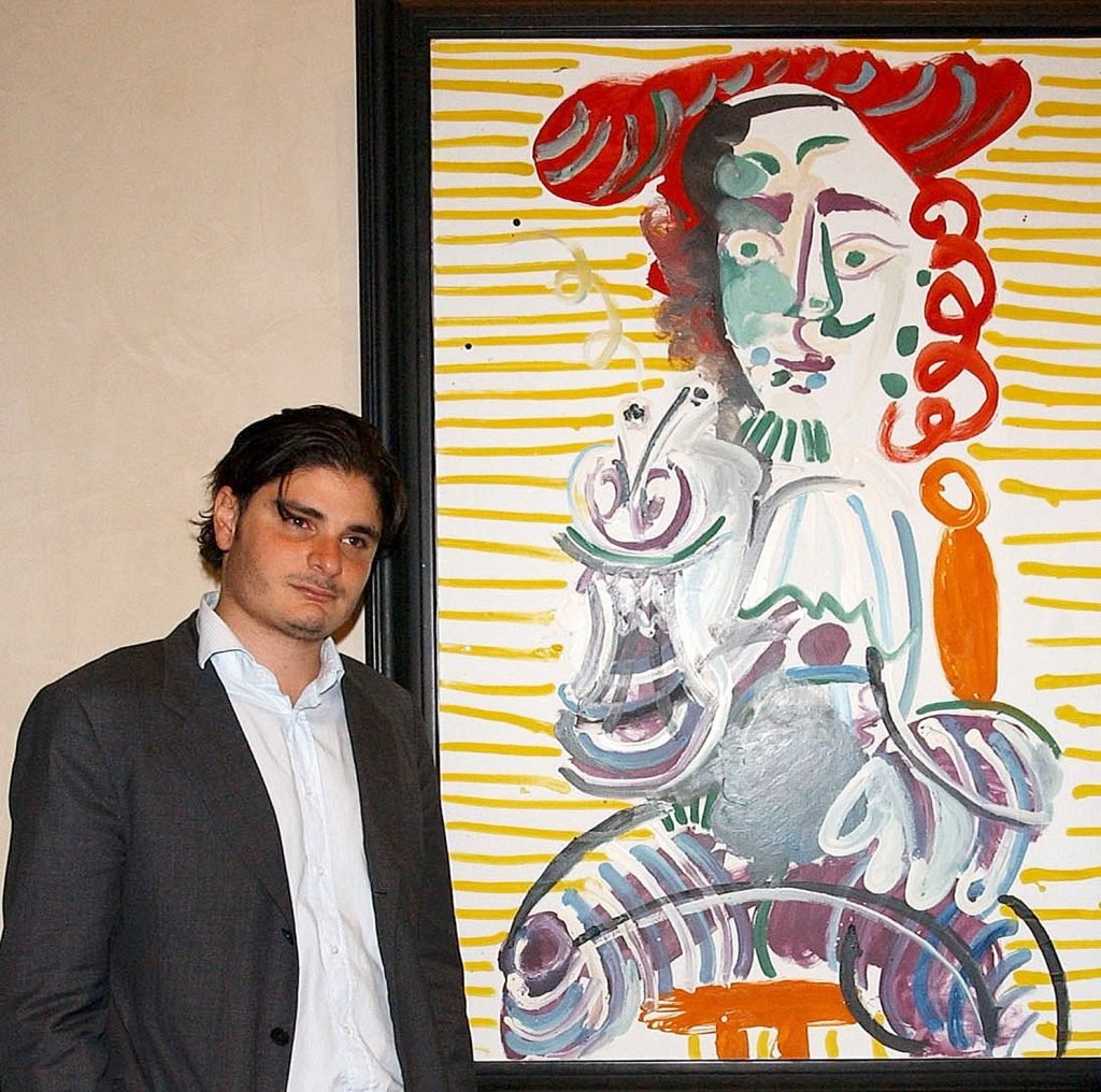 Helly Nahmad with a Picasso painting at the Helly Nahmed Gallery in the Carlysle Hotel on October 1, 2006 in New York City. Photo by Arnaldo Magnani/Getty Images.