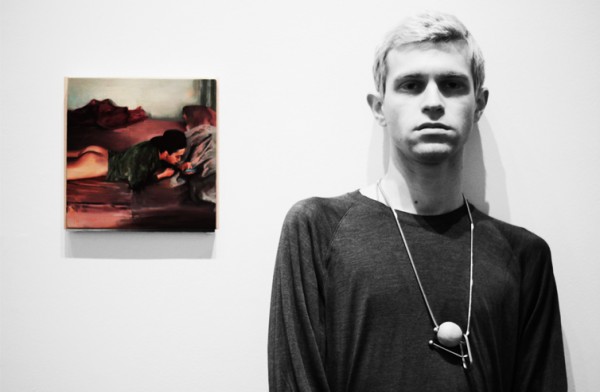Sam next to his 'BOYTWEETSWORLD' painting photographed by Maansi Jain.Image: Gayletter.