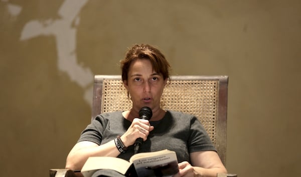 Tania Bruguera reading from Hannah Arendt's book "The Origins of Totalitarianism"Photo: Enrique de la Osa via PRI