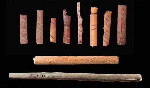 Rudimentary dice and caved sticks discovered in the Utah cave.  Photo: John Ives. 