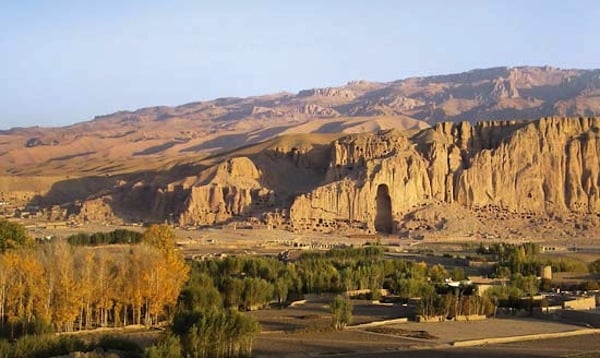 A view of the cliff in Bamiyan with an empty niche where a monumental Buddha once was. <br>Photo: via Encyclopaedia Britannica</br>