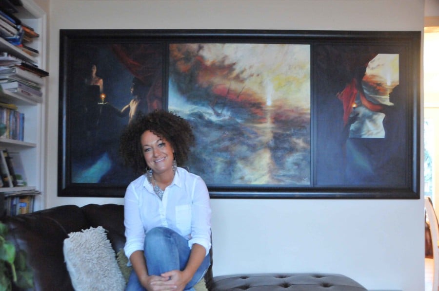 Rachel Dolezal with her Turner-sque painting. Photo: Shawntelle Moncy, courtesy the <em>Easterner</em>.