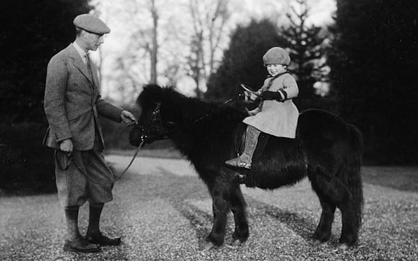 King George VI with Princess Elizabeth <br> Photo: Royal Collection