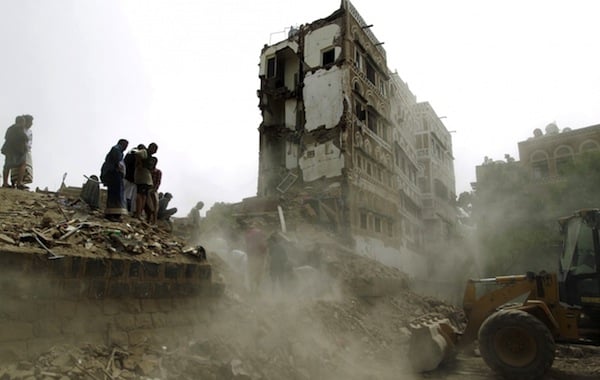 The side of a destroyed building and rubble left by the airstrike. <br>Photo: Mohammed Huwais/AFP/Getty Images</br>