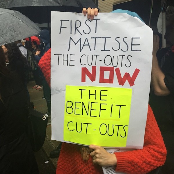 A protest sign at MoMA