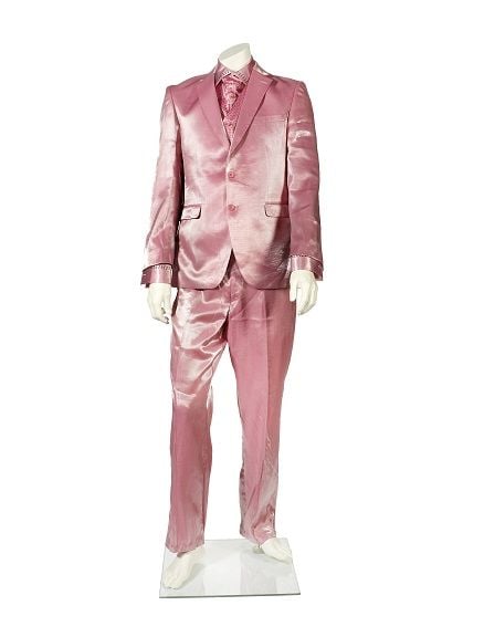 A bespoke pink three-piece suit worn by Robbie Williams at the London Palladium Photo: Bonhams