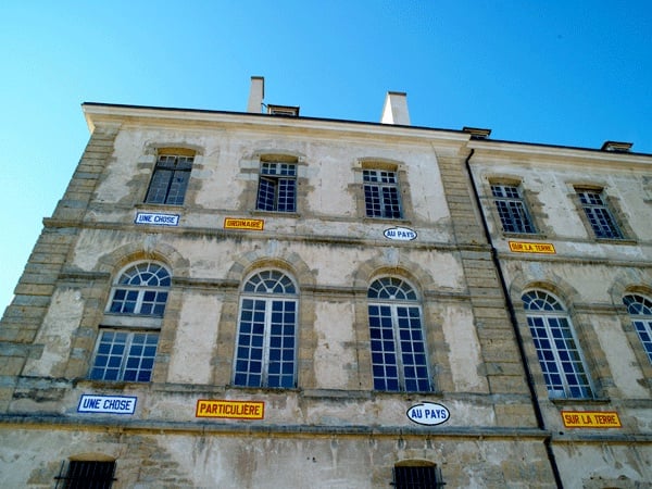 Works by Lawrence Weiner (all 2007) installed in the Abbaye de Corbigny, France, in 2009