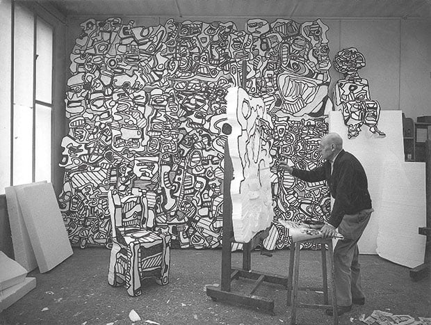 Jean Dubuffet at work on a polystyrene sculpture in Paris, June 1967. Photograph by Luc Joubert. © Archives Fondation Dubuffet , Paris. © 2014 Artists Rights Society (ARS), New York/ADAGP, Paris.