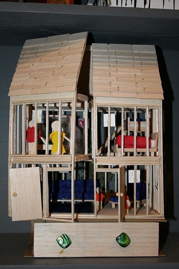  A dollhouse wood sculpture created by James Fox, an inmate at Donovan state prison. Photo: Promise Yee