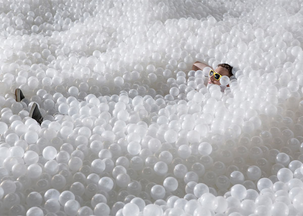 A visitor relaxes in the 'water' Photo: Dezeen