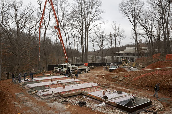 Concrete pouring at the build site for the Frank Lloyd Wright Bachman-Wilson House, at Crystal Bridges Museum of American Art in December 2014. Photo: Marc F. Henning.