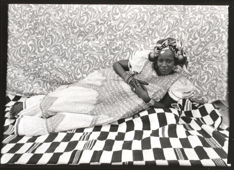 Seydou Keïta, 'Reclining Woman' (1950s-1960s). Image: The Metropolitan Museum of Art.