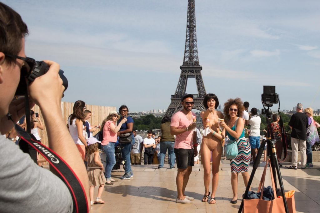 Controversial performance artist Milo Moiré took selfies with tourists for her latest work. Photo courtesy of Milo Moiré.