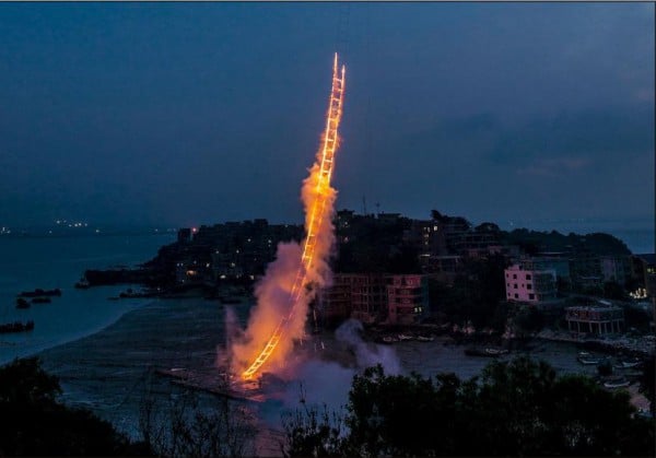 Cai Guo-Qiang, Sky Ladder, realized at Huiyu Island Harbour, Quanzhou, Fujian, June 15, 2015 at 4:49 am, approximately 2 minutes and 30 seconds. Photo: Lin Yi, courtesy Cai Studio.