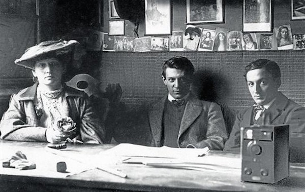 Pablo Picasso (center) with Fernande Olivier and Ramon Reventós in 1906, the year he painted Head of a Young Woman.<br>Photo: The Fedora Lounge 