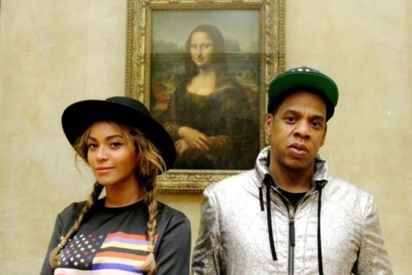 Awol Erizku, Beyoncé and Jay Z in front of the Mona Lisa. Courtesy of Beyoncé via Instagram.