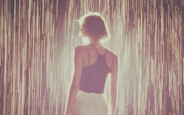 Random International, <em>Rain Room</em> (2012).  Photo: Karlie Kloss, via Instagram.