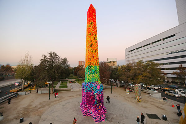 Olek crocheted a covering for this obelisk in Santiago, Chile. Courtesy of Olek.