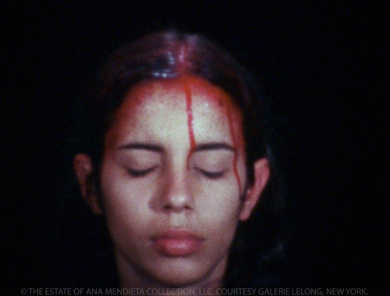 Ana Mendieta, Still from Sweating Blood (1973) Super 8 film, color, silent.  Image: Katherine E. Nash Gallery.