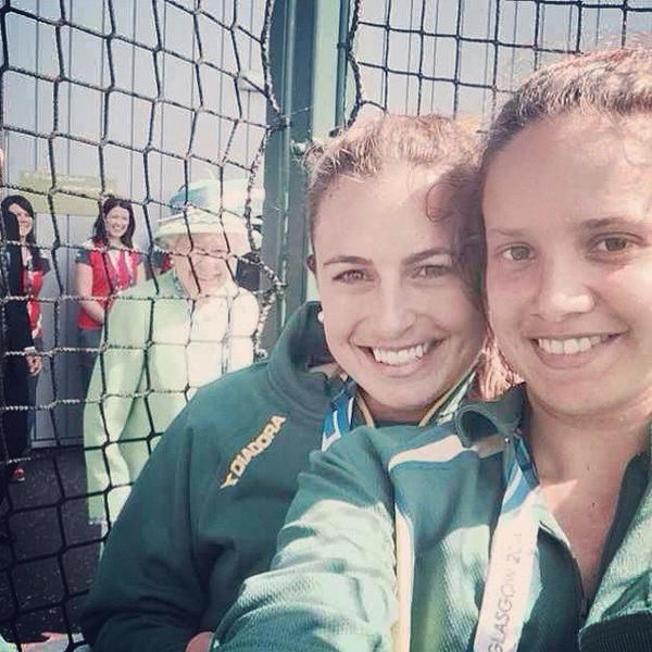 The Queen photobombs a selfie being taken by members of Australia's women's hockey team during the 2014 Commonwealth Games. Photo: Jayde Taylor, via Twitter. 