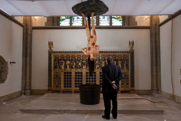  The Very Reverend Peter Bradley with Jake and Dinos Chapman's Cyber Iconic Man (1996) at Sheffield Cathedral.<br>Photo credits: Andy Brown Courtesy Going Public