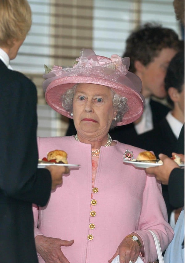 Mark Stewart, The Queen is taken by surprise as she takes tea with Eton schoolboys at Guards Polo Club (2003). Photo: Mark Stewart.