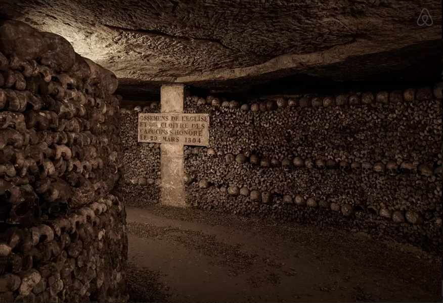 The walls of the Catacombs of Paris are lined with human skeletal remains. <br>Photo: via AirBnB</br>